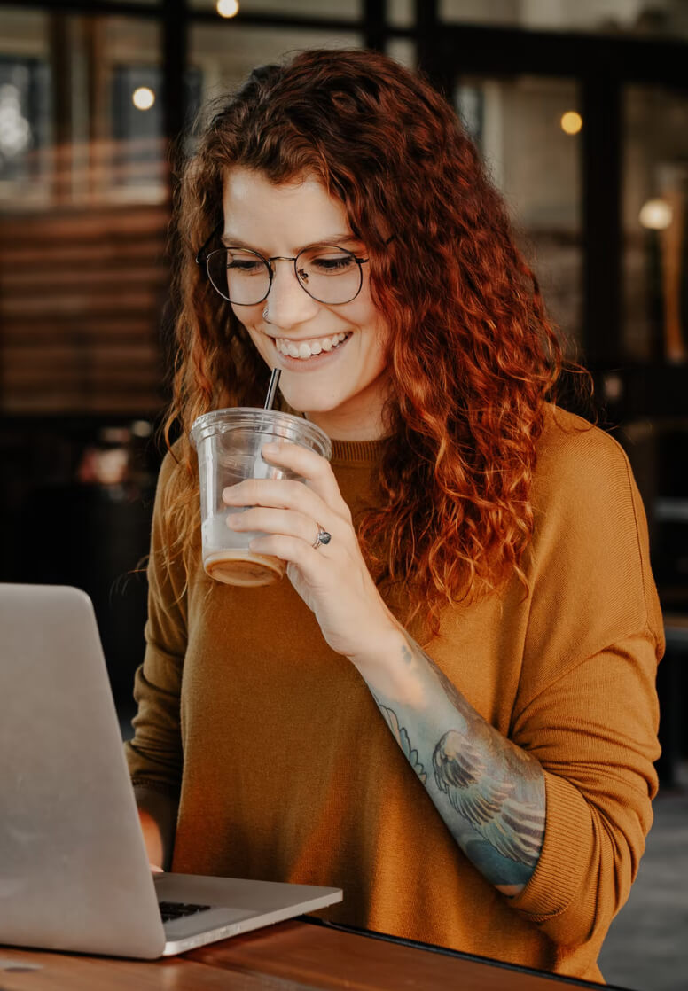 Woman smiling with laptop